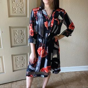 Elegant black dress with red flowers
